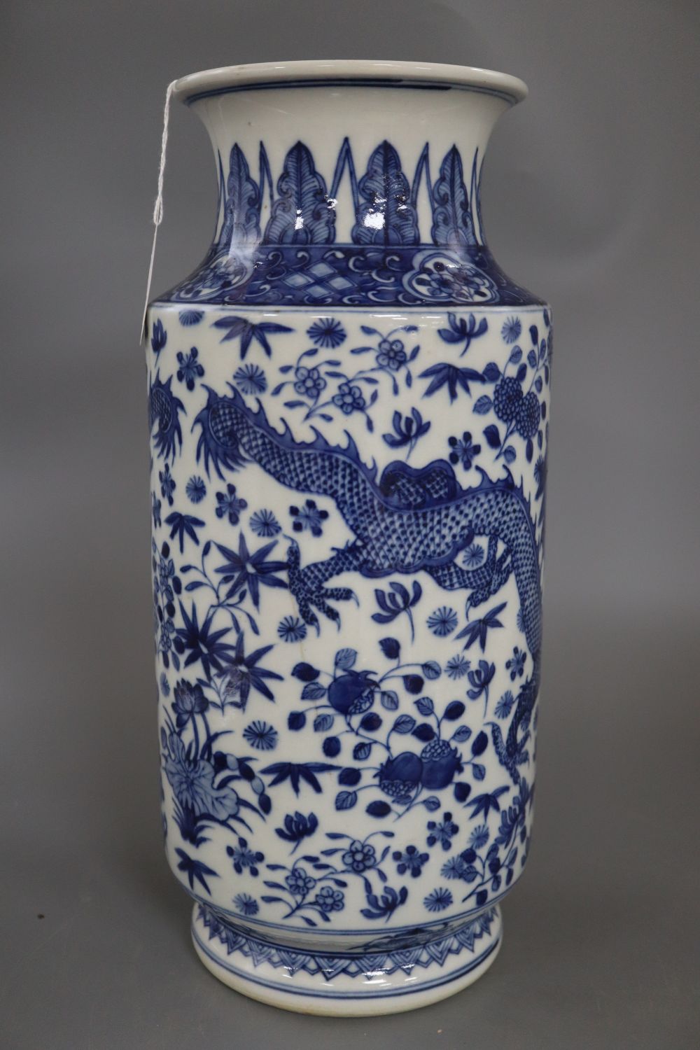 A large Chinese blue and white cylindrical dragon vase, with Kangxi mark, height 37cm